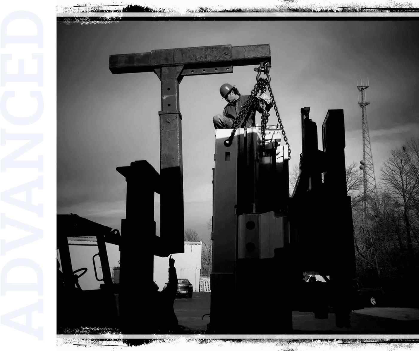 Industrial scene with silhouetted machinery